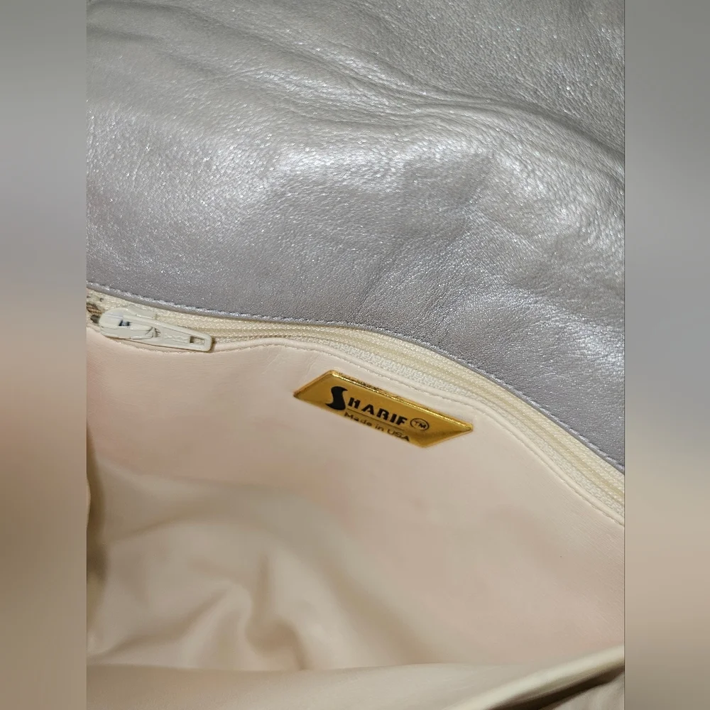 SHARIF VINTAGE CROSSBODY BAG.